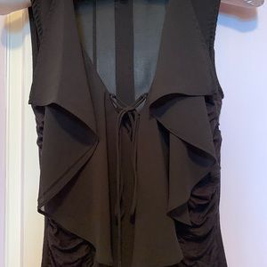 Black Sleeveless XOXO top with side ruching..